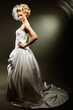 Photo: beautiful girl wearing luxurious wedding dress beautiful girl wearing luxurious wedding dress