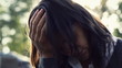 Sad, depressed young woman in the city