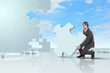 Businessman with a puzzle pieces