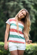 Young and beautiful woman walking in the park