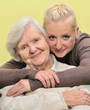 Senior woman with her granddaughter. Happy and smiling.