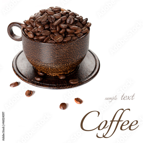 Photo: Coffee beans with sample text on a white background Coffee beans with sample text on a white background