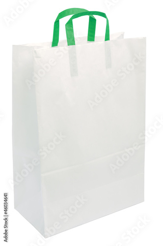 Photo: White Paper Bag, Green Handles, Isolated Closeup Copy Space White Paper Bag, Green Handles, Isolated Closeup Copy Space
