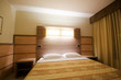 Photo: Double bed in the modern room Double bed in the modern room
