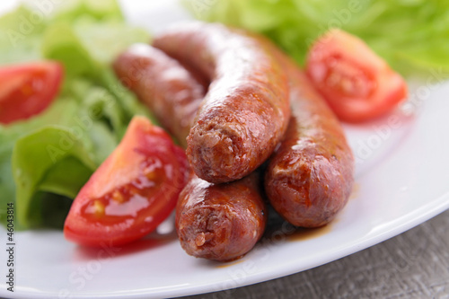 Photo: grilled sausage and salad grilled sausage and salad
