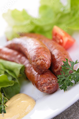Photo: grilled sausage and salad grilled sausage and salad