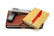 Dictaphone, notepad and ballpen isolated on white background