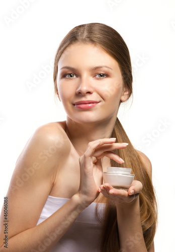 Photo: cosmetic preparation in hands of girl cosmetic preparation in hands of girl