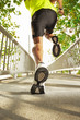 man running across the bridge