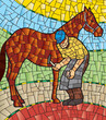 blacksmith working horseshoe to horse