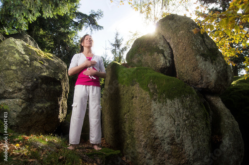 Photo: Relaxing Woman between Rocks Relaxing Woman between Rocks