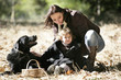 Mother and daughter with a dog