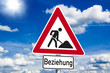 Schild Baustelle mit Beziehung und Sonne