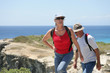 Foto: Senior couple hiking by the sea Senior couple hiking by the sea