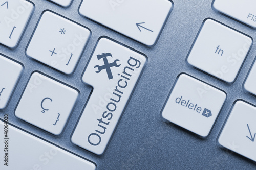 Photo: Outsourcing. Keyboard key. Blue Outsourcing. Keyboard key. Blue