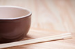 Photo: Bowl with chopsticks. Bowl with chopsticks.