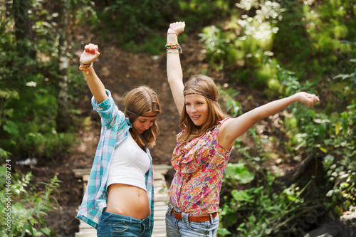Photo: Young girls on the wooden bridge Young girls on the wooden bridge
