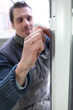 Man fitting double glazing
