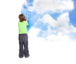 young child boy painting blue sky over white wall