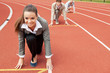 Business woman at athletic stadium