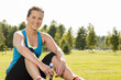 Happy woman jogger training in the park. Healthy lifestyle and p