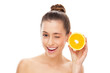 Woman holding an orange