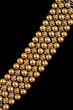 Close-up of gold necklace portion