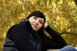 Beautiful woman in autumn forrest
