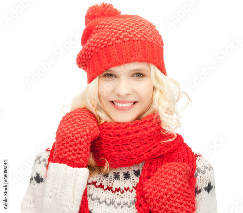 Photo: beautiful woman in hat, muffler and mittens beautiful woman in hat, muffler and mittens