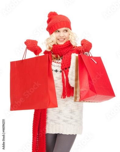 Photo: young girl with shopping bags young girl with shopping bags