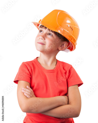Photo: Little girl in the construction helmet Little girl in the construction helmet