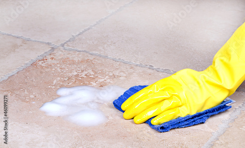 Photo: cleaning tile with cloth cleaning tile with cloth