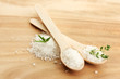 salt in spoons with fresh  rosemary and thyme