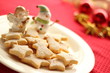 Photo: Christmas cookies and ornaments on red background Christmas cookies and ornaments on red background