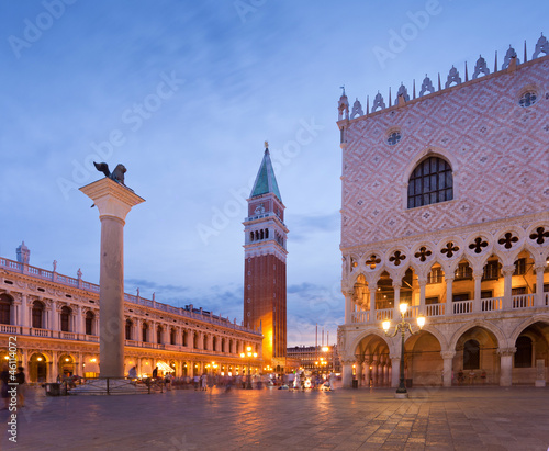  San Marco square with Campanile and Doge Palace after sunset. Ve