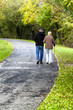 Old family walking in park