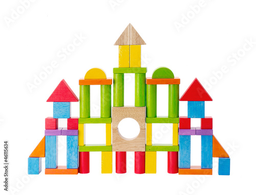 Photo: Colorful wooden toy castle on white Colorful wooden toy castle on white