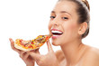 Photo: Woman eating pizza Woman eating pizza