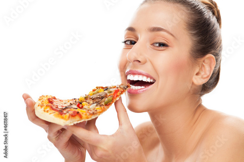 Photo: Woman eating pizza Woman eating pizza