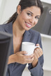 Woman Businesswoman Drinking Coffee in Office