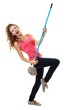 woman having fun by playing air guitar