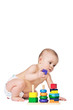 Small child play with toys on white background