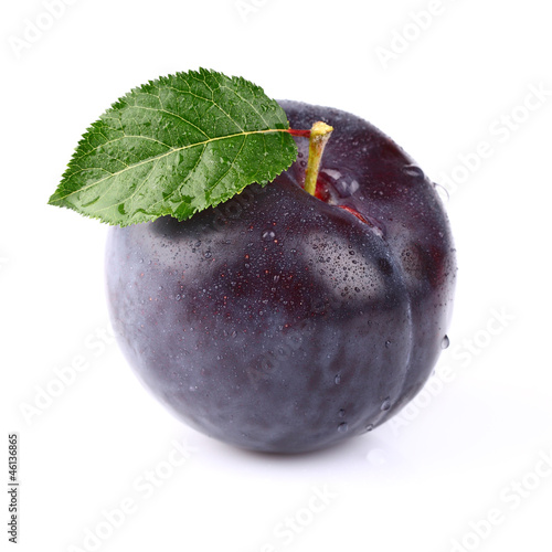 Photo: One ripe fresh plum with leaf One ripe fresh plum with leaf