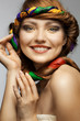 portrait of smiling beautiful young woman on white