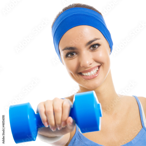 Photo: Cheerful woman exercising with dumbbell, over white Cheerful woman exercising with dumbbell, over white