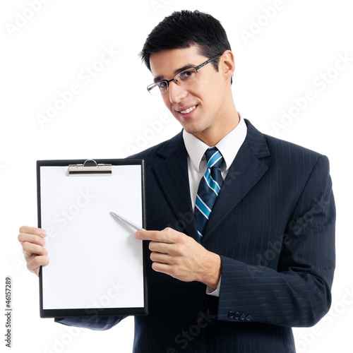 Photo: Businessman showing signboard, isolated Businessman showing signboard, isolated