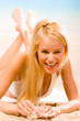 Photo: Happy young woman on the beach Happy young woman on the beach