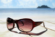 Sunglasses over the beach