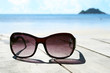 Sunglasses and sea