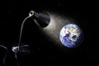 Desk lamp illuminates the Earth